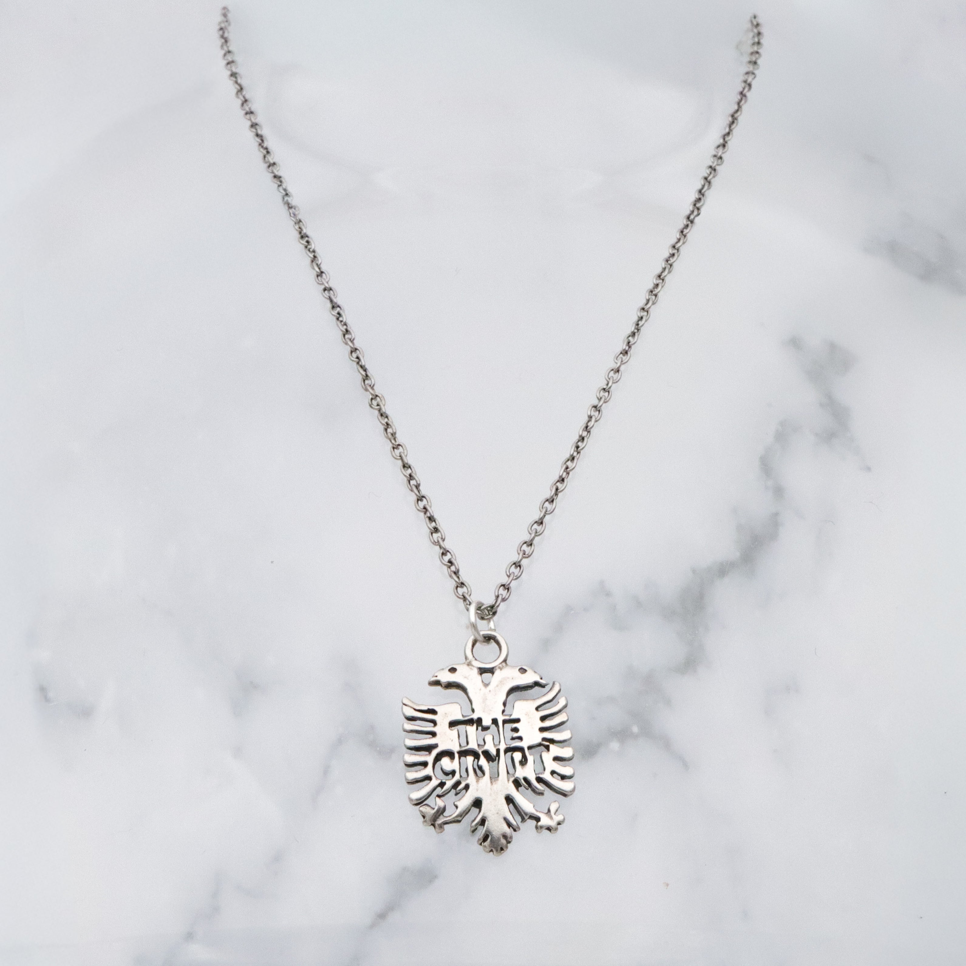 Vintage sterling "The Crypt" Seattle double headed eagle pendant